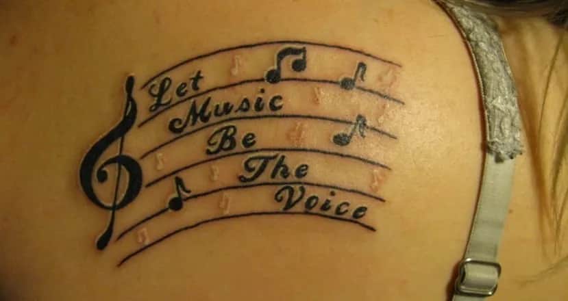 Tatuaż nuty znaczenie - odkryj głębię symboliki muzycznych tatuaży